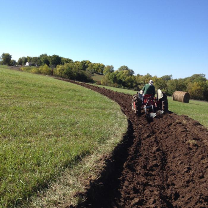 Building water catchment swales with a tractor